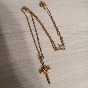 Cross necklace with stone in center